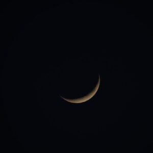 New Moon — Caitra Śukla Pratipadā (Ugādi) 19 March 2026 A peacefully subtle crescent moon set against a deep, dark night sky.